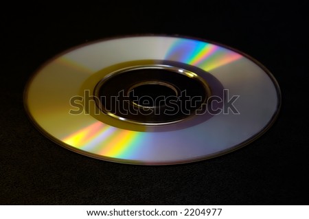 studio photo of compact disk with magic light