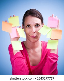 Studio Photo Of Concerned Woman With Too Much Work On Hand.