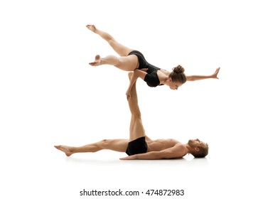 Studio Photo Of Couple Practising Acrobatics