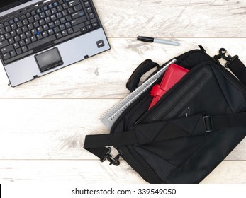 A Studio Photo Of A Laptop Shoulder Bag