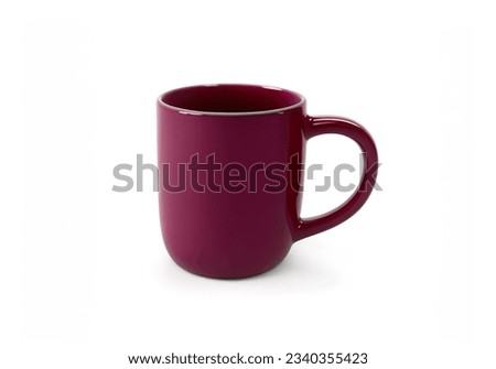 STUDIO PHOTO of maroon mug, isolated on white background.