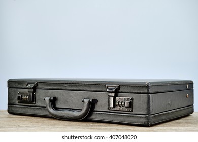 A Studio Photo Of An Old Leather Briefcase