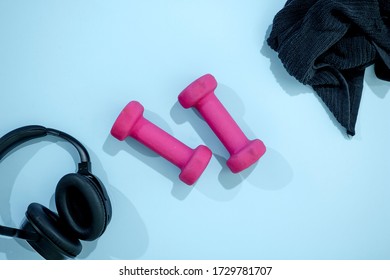 A Studio Photo Of Pink Dumbells