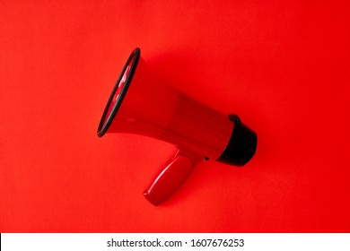 A Studio Photo Of A Red Mega Phone