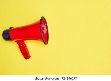 A Studio Photo Of A Red Mega Phone