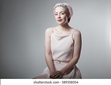 Studio Photo Of Retro Style Woman, Smiling.