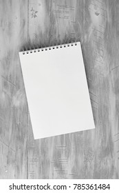 A studio photo of a sketch pad