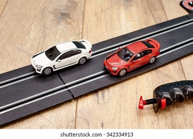 A Studio Photo Of A Slot Car Race Set