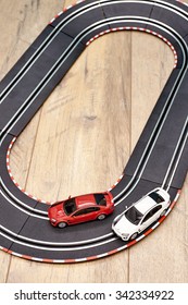 A Studio Photo Of A Slot Car Race Set