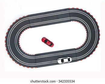 A Studio Photo Of A Slot Car Race Set