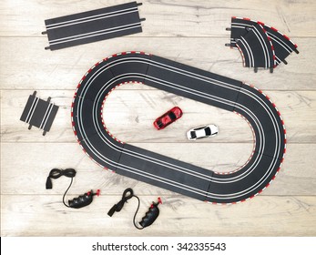 A Studio Photo Of A Slot Car Race Set