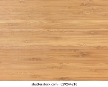 A studio photo of a wooden bamboo background - Shutterstock ID 329244218