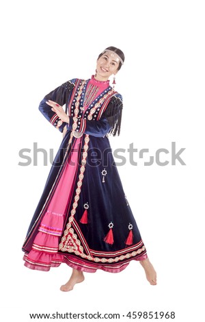 Studio photo of a young woman isolated on white background in traditional Muslim clothing Bashkirs, residents of the Republic of Bashkortostan, Russia