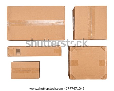 A studio photograph displaying multiple brown corrugated cardboard boxes, sealed with tape and ready for shipping or storage.