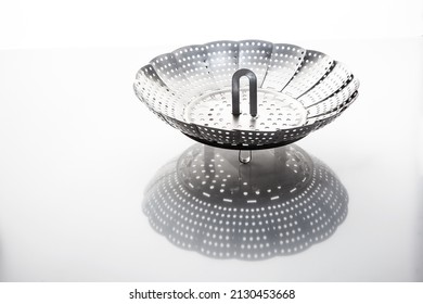 Studio Photograph Of A Kitchen Strainer