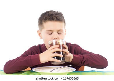 Studio Photography Of A Child Drinking A Soda