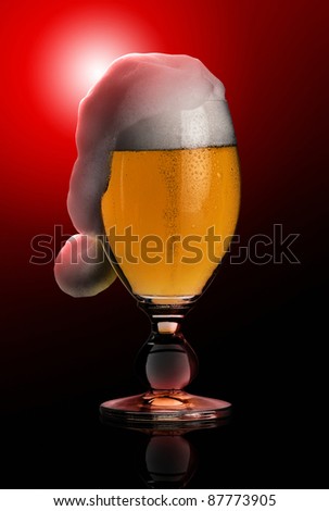 studio photography showing a glass of pils beer with funny foam shaped like a jelly bag cap in black back