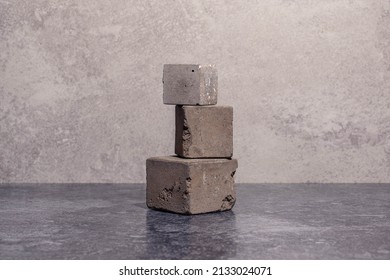 Studio photoshoot of  textured abstract still life composition with cube squares