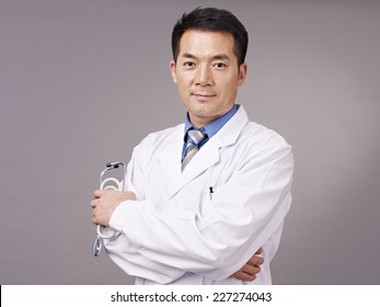 Studio Portrait Of An Asian Doctor.