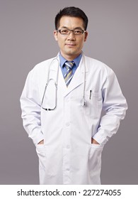 Studio Portrait Of An Asian Doctor.