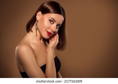 Studio portrait bare shoulders stunning woman touching her cheekbone standing profile showing cosmetic night visage