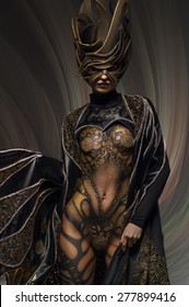 Studio Portrait Of Beautiful Model With Fantasy Golden Butterfly Body Art And Crown