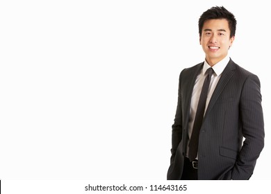 Studio Portrait Of Chinese Businessman