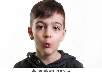 Studio Portrait Cute Boy Whistling 