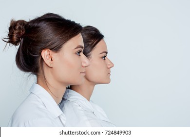 Studio Portrait Of Female Twins