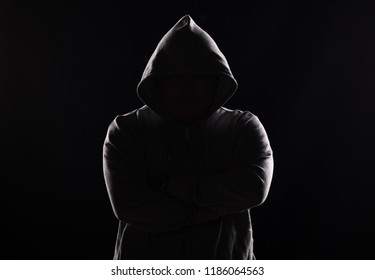 scary man in black hoodie