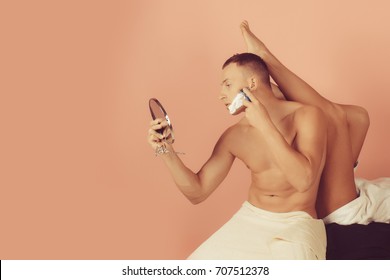 Studio Portrait Of Handsome Young Man. Man With Naked Torso Having Skin Irritation After Shaving. Man Holding Disposable Razor. Sexy Woman Legs. Bathroom Couple. Sexy Man. Razor Concept. Fashion Photo