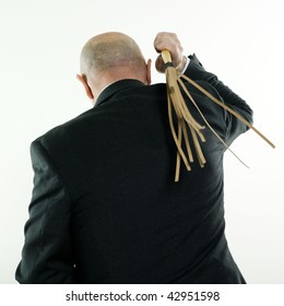 Studio Portrait Isolated On White Background Of A Man Senior Back Whipping Himself