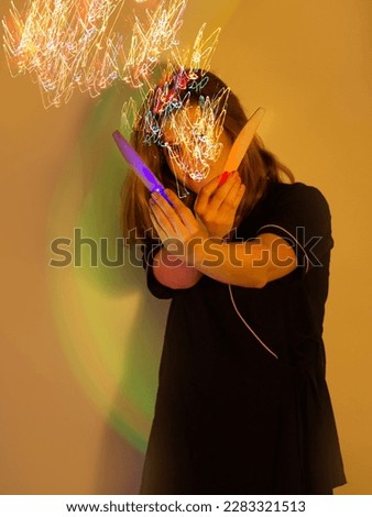 Similar – Long exposure at night of a woman waving her hands. What a pity that you stop here!