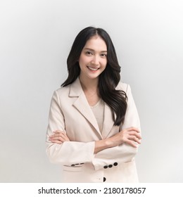 Studio portrait photo of young beautiful Asian woman in formal suit dressing with confident and luxury looking and attractive on white background studio shot. - Shutterstock ID 2180178057
