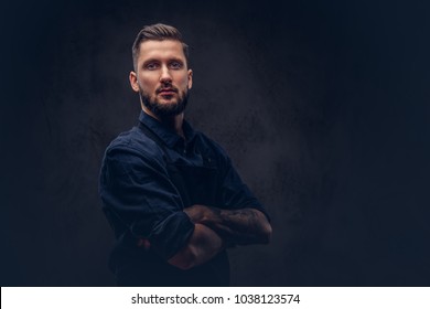 Studio portrait of a professional bearded butcher with hairstyle - Powered by Shutterstock