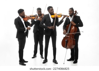 Studio portrait of a string quartet on a white background. African americans
