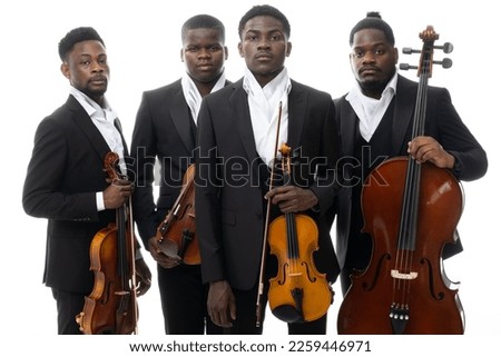 Studio portrait of a string quartet on a white background. African americans