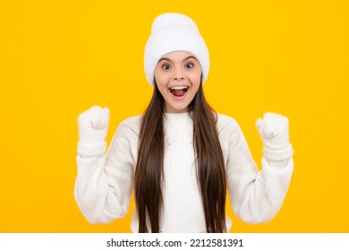 Studio Portrait Of Teenager Child Doing Winner Gesture. Kid Rejoicing, Yes Victory Champion Gesture, Fist Pump.