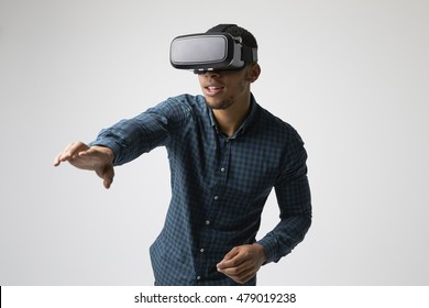 Studio Portrait Of Video Game Designer Wearing VR Headset