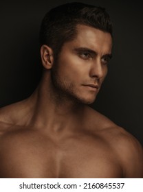 Studio Profile Portrait Of Handsome Male Model