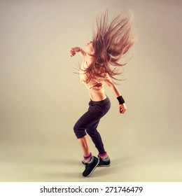 Studio Shoot Of Active Female Funk Jazz Dancer Moving. Sport And Leisure Concept. Zumba Dance.