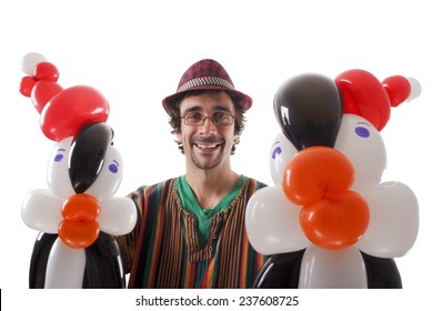 Studio Shot Of Balloon Twister With Penguins And Balloons Isolated On White.