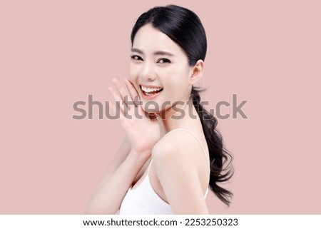 Studio shot of Beautiful young Asian woman with clean fresh skin on pink background, Face care, Facial treatment, Cosmetology, beauty and spa.