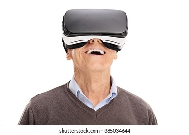 Studio Shot Of A Cheerful Senior Using A VR Headset Isolated On White Background