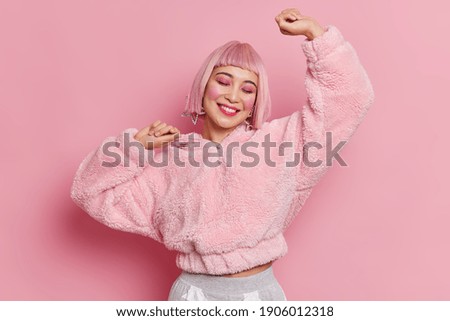 Similar – Image, Stock Photo woman with pink wig smiling happily on pink background