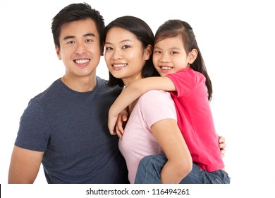 Studio Shot Of Chinese Family