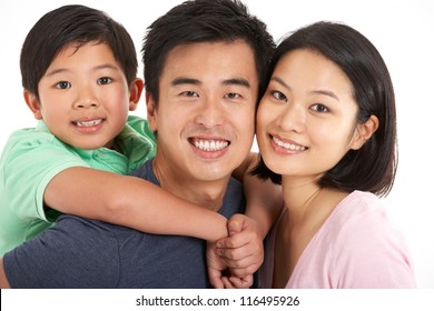 Studio Shot Of Chinese Family