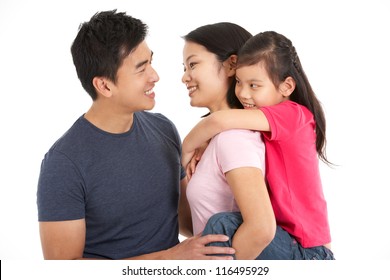 Studio Shot Of Chinese Family