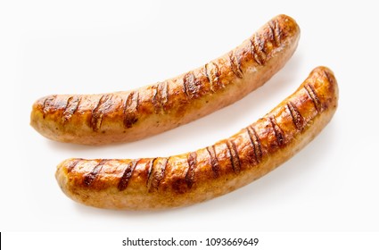 Studio shot close-up of two grilled German sausages on white background for copy space