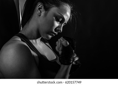 Studio shot of female boxer. Black And White. - Powered by Shutterstock